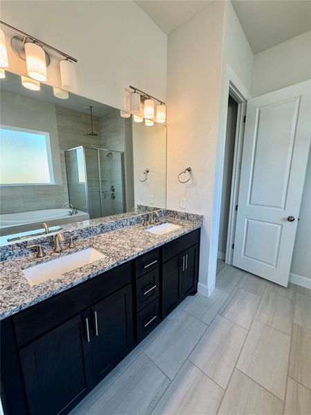 Double vanity and granite countertops
