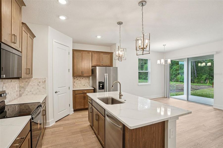 Furnished interior view inside a new home in Ridgehaven - Signature Series, Ormond Beach (Image 9).