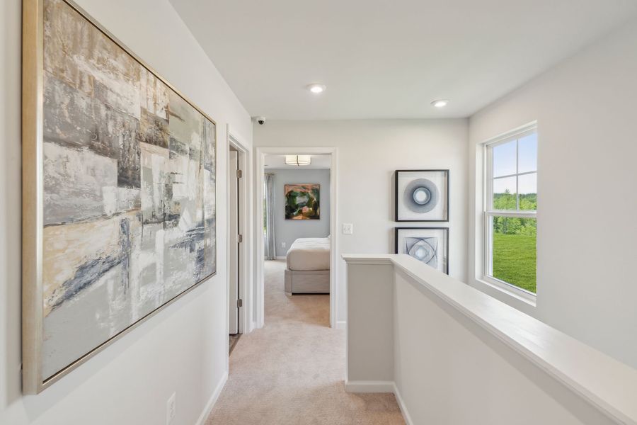 Representative furnished interior of a home built from the The Rutledge by Stanley Martin Homes in Essence at Trinity Townhomes, Columbia (Image 55).