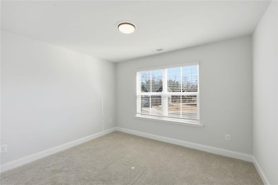Spacious, unfurnished interior of a new home in Berkeley Mill, Cumming (Image 40).