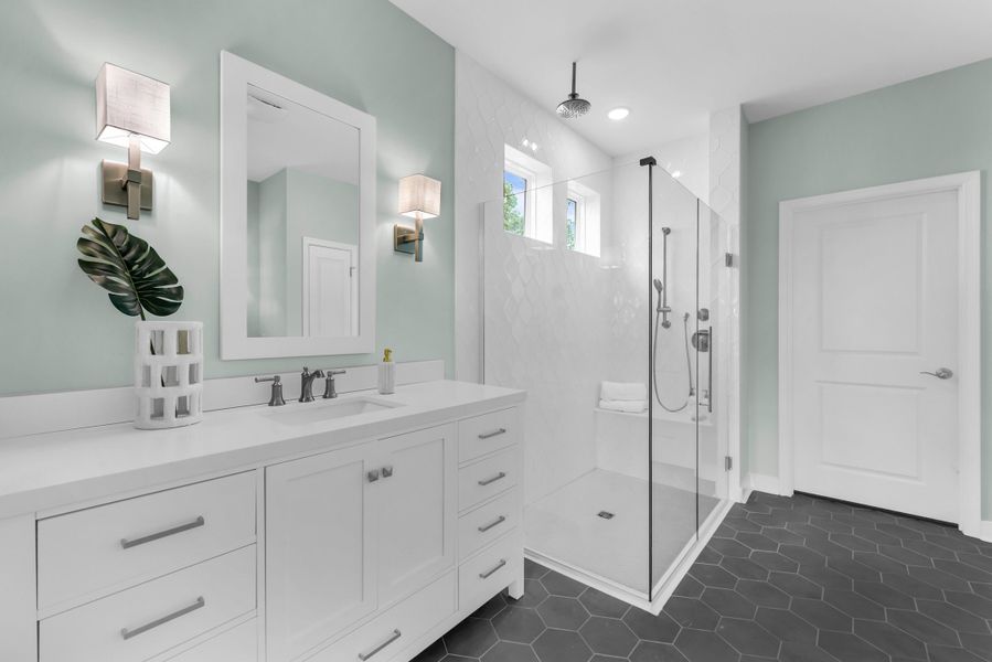 Primary bath with glass shower enclosure