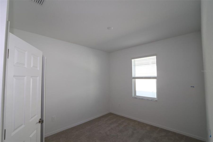 Spacious, unfurnished interior of a new home in , Sarasota (Image 9).