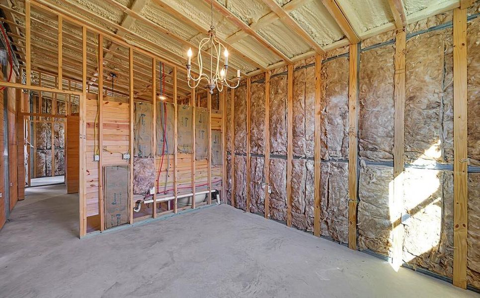 Miscellaneous room with a chandelier Miscellaneous room with a chandelier