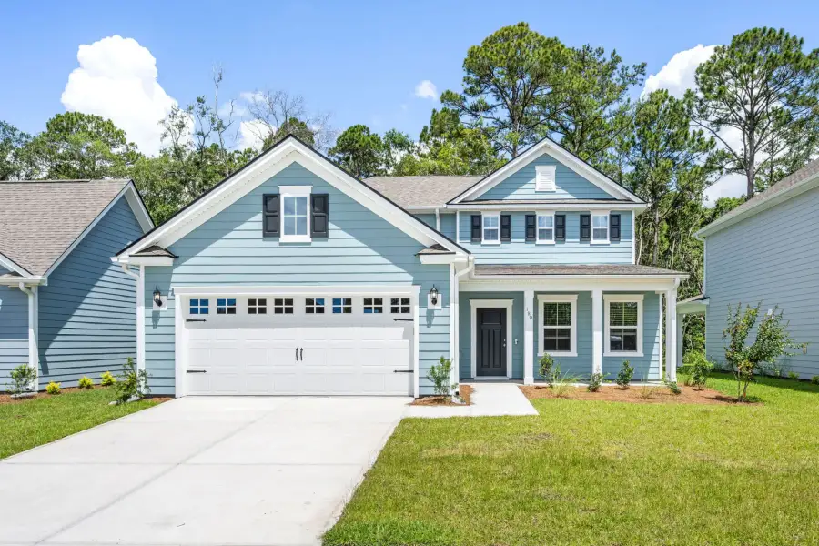 Front exterior of a new home in Solserra, Shallotte, NC, highlighting curb appeal (Image 19).
