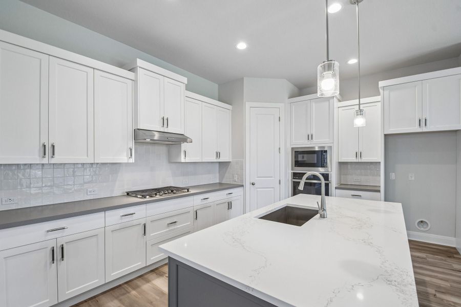 Furnished interior view inside a new home in 6 Creeks, Kyle (Image 4).