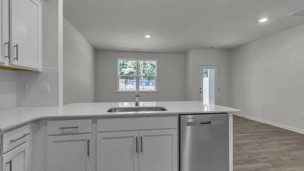Furnished interior view inside a new home in The Townes at Prestleigh, Wake Forest (Image 6). Furnished interior view inside a new home in The Townes at Prestleigh, Wake Forest (Image 6).