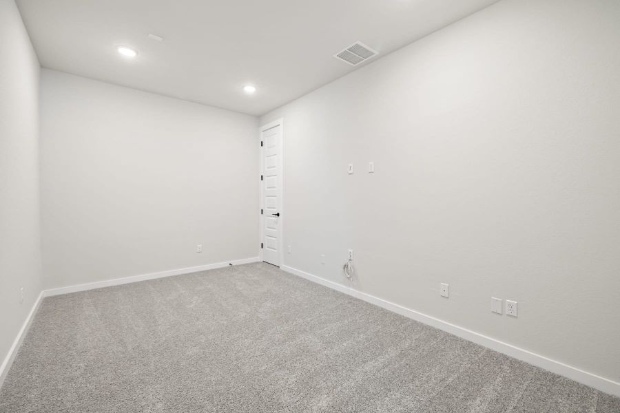 Spacious, unfurnished interior of a new home in Lariat, Liberty Hill (Image 44).