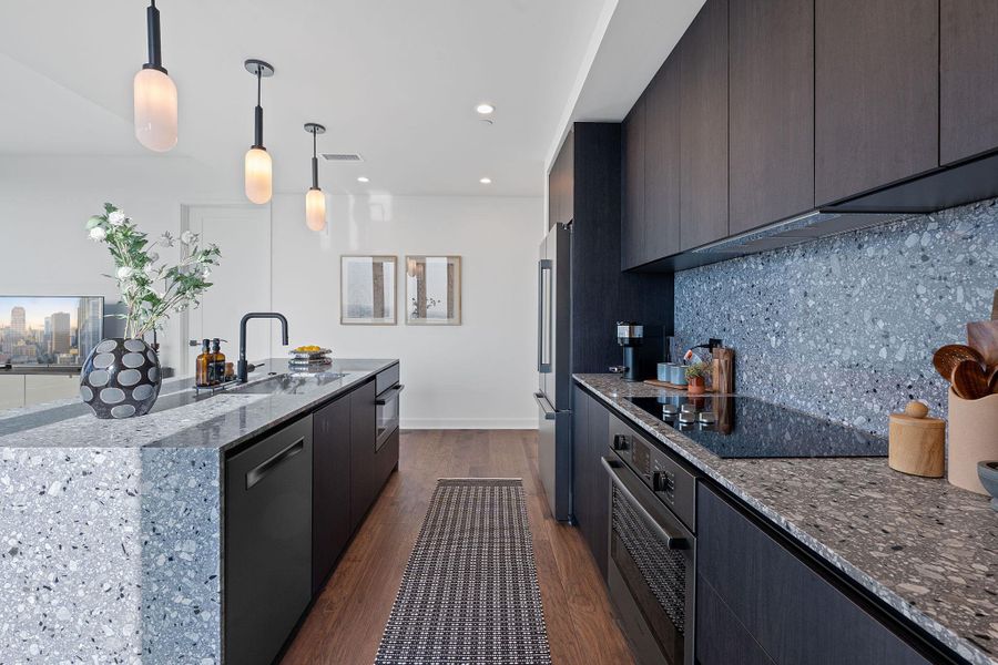 Your new kitchen is equipped with Bosch appliances, and custom lighting and plumbing fixtures.