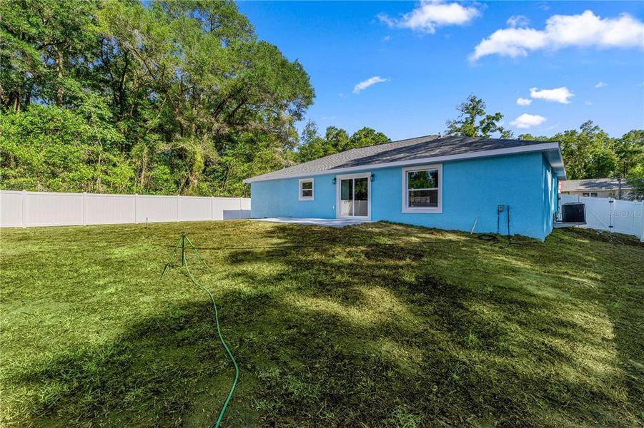 Exterior details and patio area of a home in , Summerfield (Image 17).