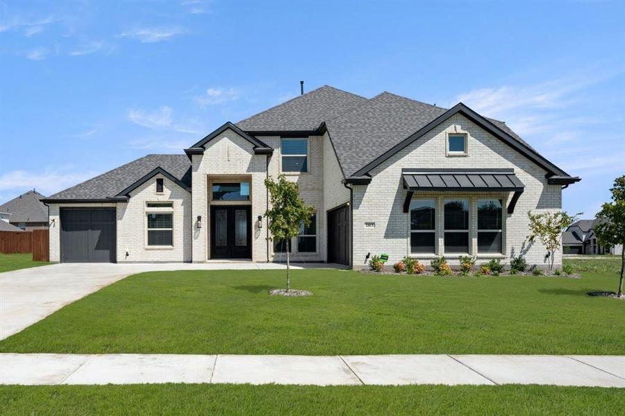 Front exterior of a new home in Shady Valley Estates, Midlothian, TX, highlighting curb appeal (Image 25). Front exterior of a new home in Shady Valley Estates, Midlothian, TX, highlighting curb appeal (Image 25).