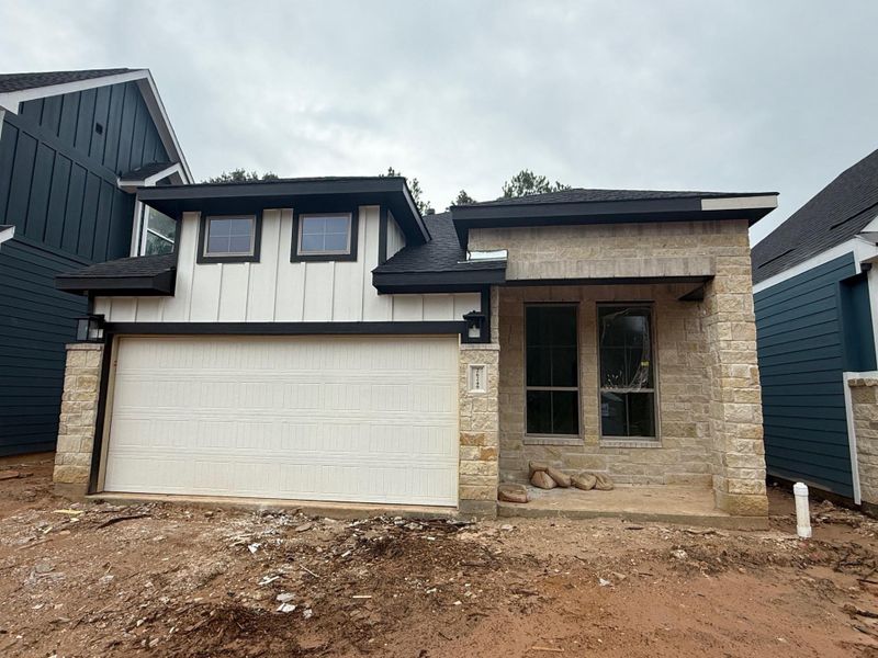 Front exterior of a new home in Kresston, Montgomery, TX, highlighting curb appeal (Image 2).