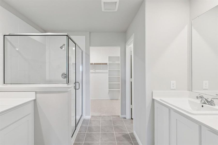 Primary Bathroom in the Harrison home plan by Trophy Signature Homes – REPRESENTATIVE PHOTO Primary Bathroom in the Harrison home plan by Trophy Signature Homes – REPRESENTATIVE PHOTO