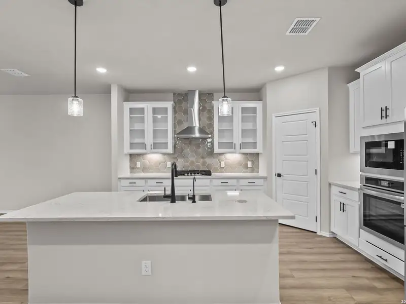 Furnished interior view inside a new home in Bricewood, San Antonio (Image 12).