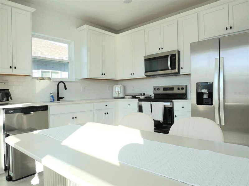 Furnished interior view inside a new home in Laureate Park, Orlando (Image 4).