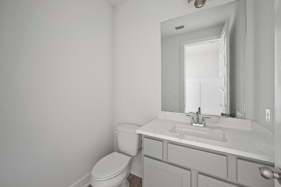 Furnished interior view inside a new home in Flora - 60', Hutto (Image 15).