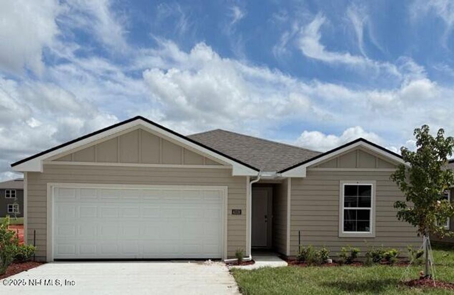 Front exterior of a new home in The Arbors, Jacksonville, FL, highlighting curb appeal (Image 2).