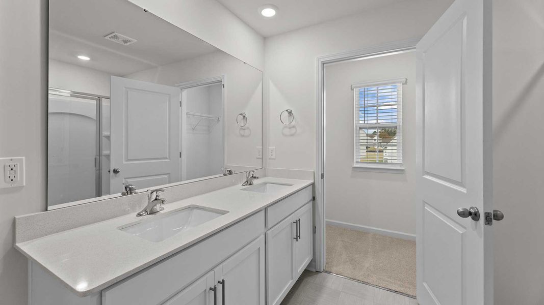Furnished interior view inside a new home in Beaver Dam Crossing, Bailey (Image 9).