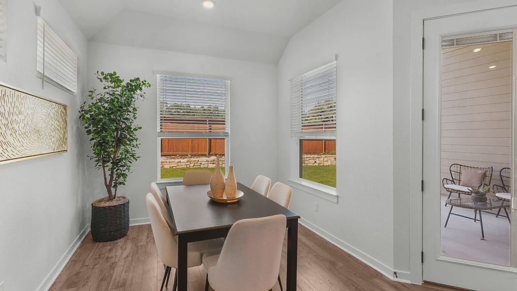 Representative furnished interior of a home built from the Brooks by Chesmar Homes in University Heights, Round Rock (Image 14).
