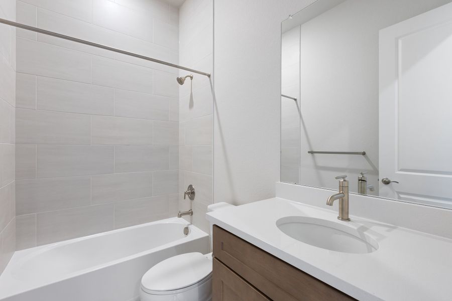 Furnished interior view inside a new home in The Manors Collection at Golden Overlook, Lakewood (Image 9).