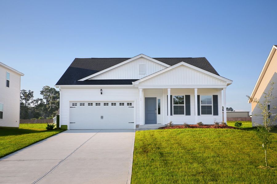 Front exterior of a new home in Jordan Grove, Conway, SC, highlighting curb appeal (Image 1). Front exterior of a new home in Jordan Grove, Conway, SC, highlighting curb appeal (Image 1).