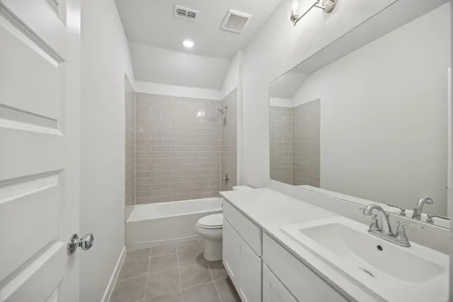 Bathroom in the Wimbledon home plan by Trophy Signature Homes – REPRESENTATIVE PHOTO Bathroom in the Wimbledon home plan by Trophy Signature Homes – REPRESENTATIVE PHOTO
