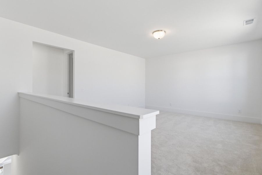 Spacious, unfurnished interior of a new home in Homecoming, Ravenel (Image 22). Spacious, unfurnished interior of a new home in Homecoming, Ravenel (Image 22).