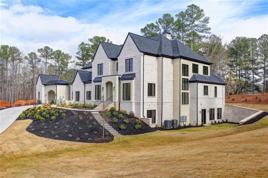 Front exterior of a new home in , Alpharetta, GA, highlighting curb appeal (Image 2).