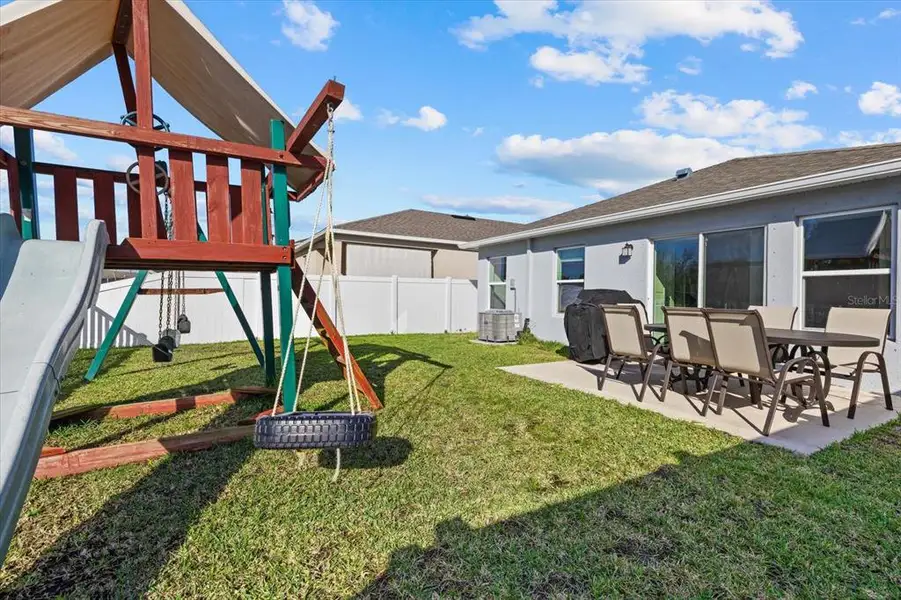 Exterior details and patio area of a home in , Parrish (Image 4).