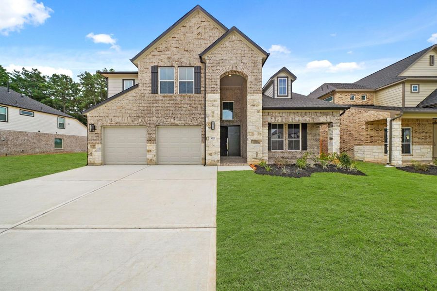 Front exterior of a new home in Barton Creek Ranch, Conroe, TX, highlighting curb appeal (Image 1). Front exterior of a new home in Barton Creek Ranch, Conroe, TX, highlighting curb appeal (Image 1).