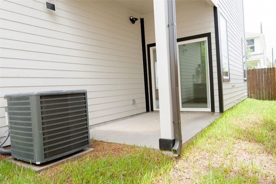 Exterior details and patio area of a home in , Houston (Image 3).