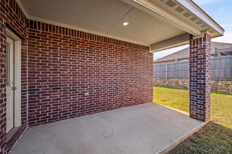 Exterior details and patio area of a home in Azle Grove, Azle (Image 30).