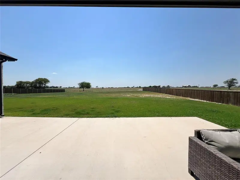 View of patio with a rural view