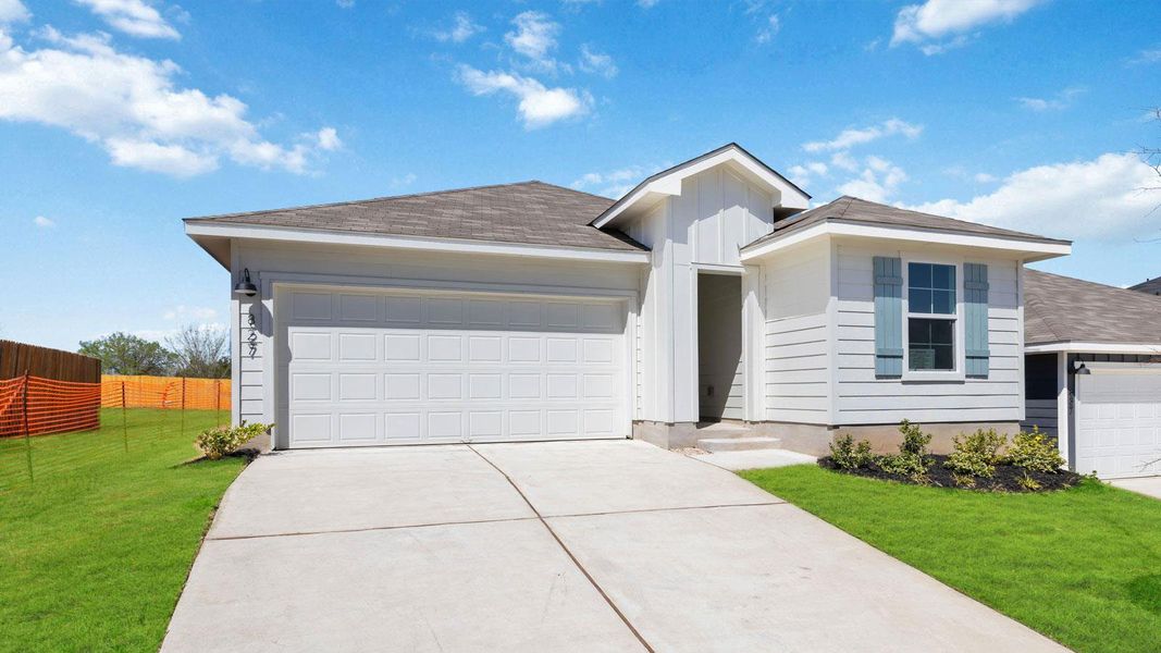 Front exterior of a new home in Wayside, Uhland, TX, highlighting curb appeal (Image 2).