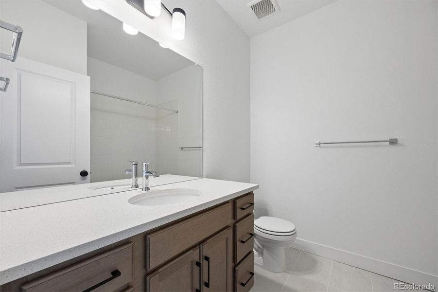 Second bathroom on upper level.