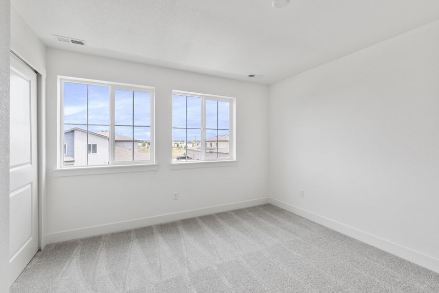 Spacious, unfurnished interior of a new home in Trailside on Harmony, Timnath (Image 48).