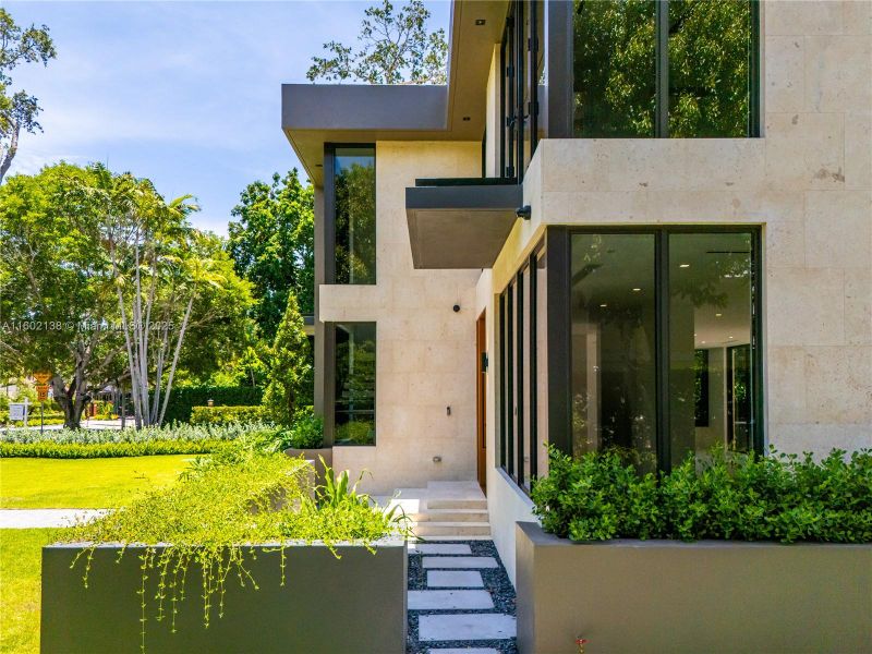 Front exterior of a new home in , Miami, FL, highlighting curb appeal (Image 27).