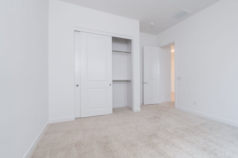 Spacious, unfurnished interior of a new home in Waterston Central, Gilbert (Image 12).