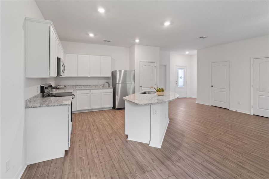 Furnished interior view inside a new home in , Kissimmee (Image 6).
