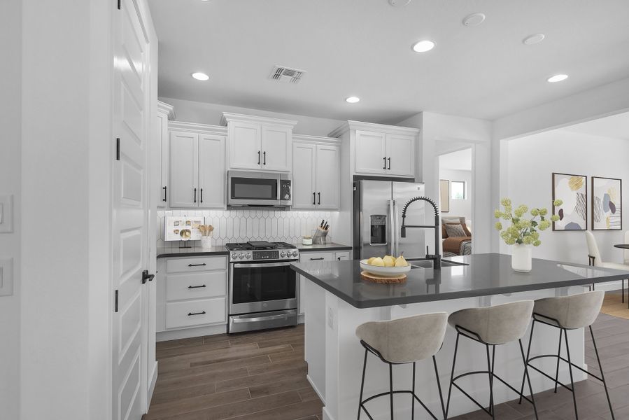 Furnished interior view inside a new home in CantaMia at Estrella 55+, Goodyear (Image 4).
