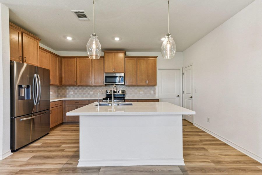 Furnished interior view inside a new home in Stonewall Ranch, Liberty Hill (Image 6).
