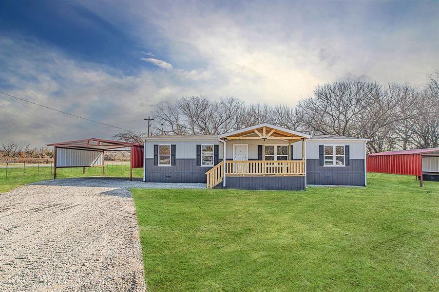 Front exterior of a new home in , Azle, TX, highlighting curb appeal (Image 14).