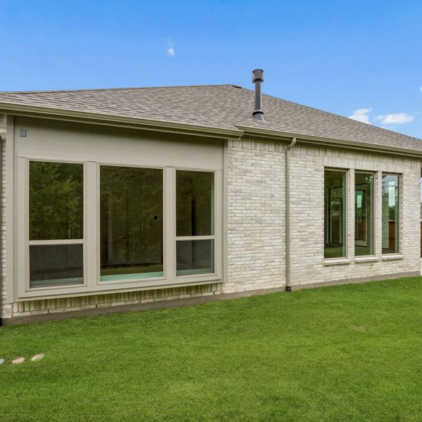 Exterior details and patio area of a home in The Parks at Wilson Creek, Celina (Image 30). Exterior details and patio area of a home in The Parks at Wilson Creek, Celina (Image 30).