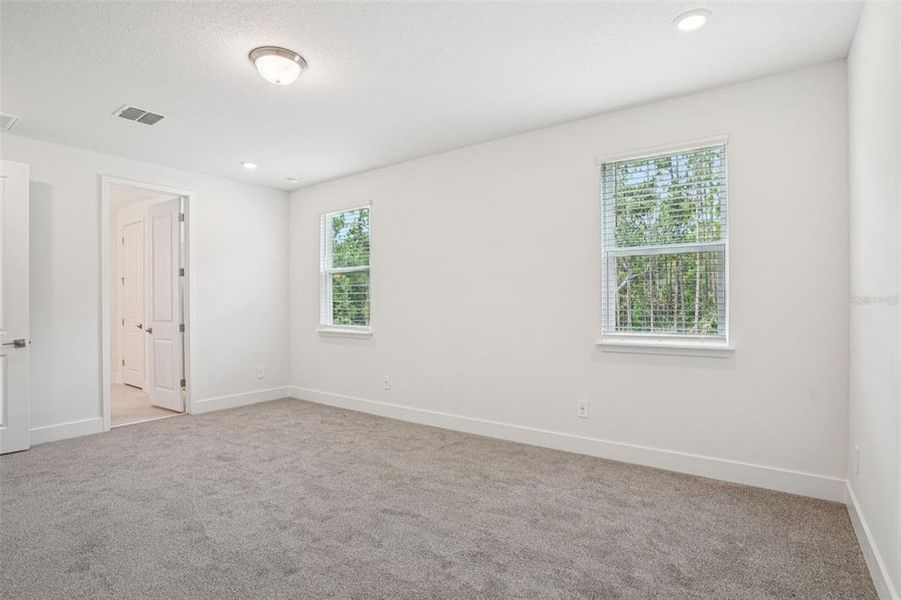 Spacious, unfurnished interior of a new home in Ridgehaven - Signature Series, Ormond Beach (Image 47).