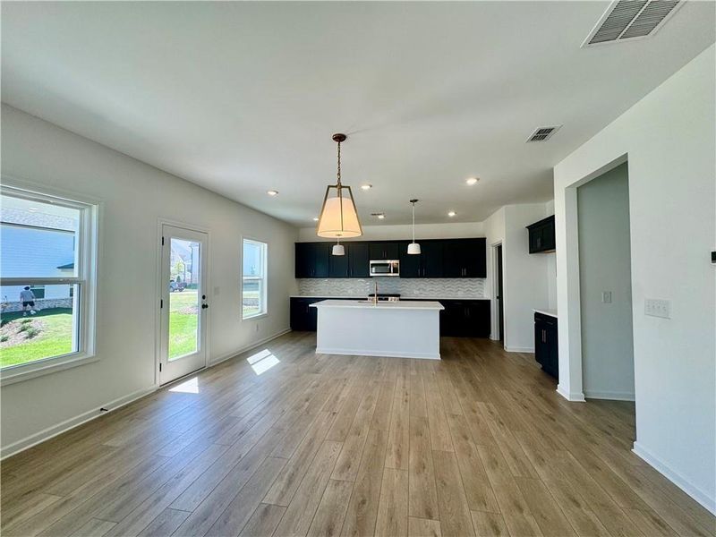 Spacious, unfurnished interior of a new home in Eastlyn Crossing, Flowery Branch (Image 26).