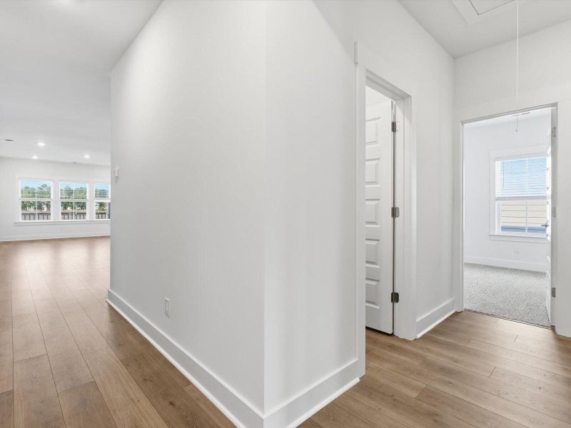 Spacious, unfurnished interior of a new home in The Coves at Lakes of Cane Bay, Summerville (Image 40).