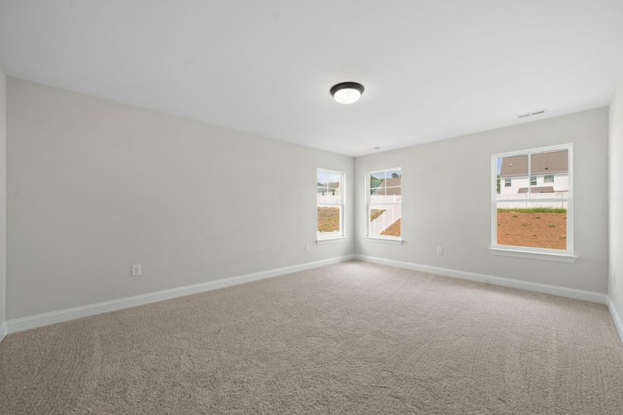 Spacious, unfurnished interior of a new home in Cottages at Piper Village, Trinity (Image 32).
