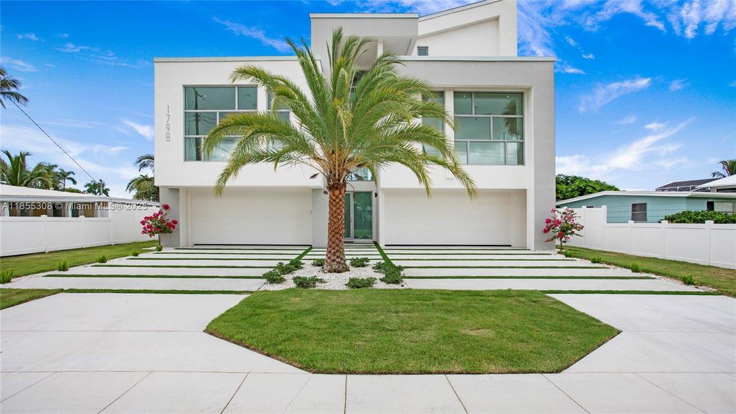 Front exterior of a new home in , Naples, FL, highlighting curb appeal (Image 23).