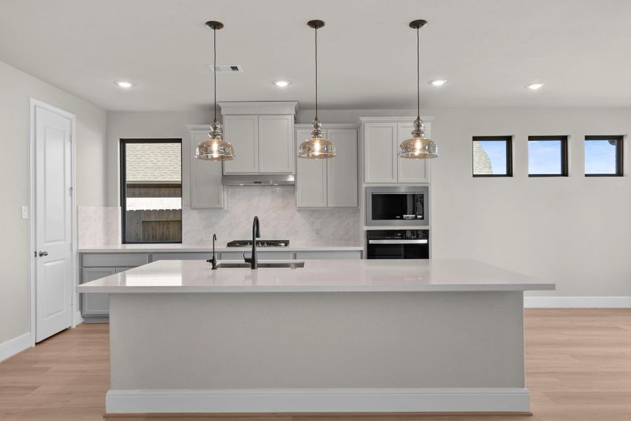 Furnished interior view inside a new home in Coastal Point, League City (Image 6).