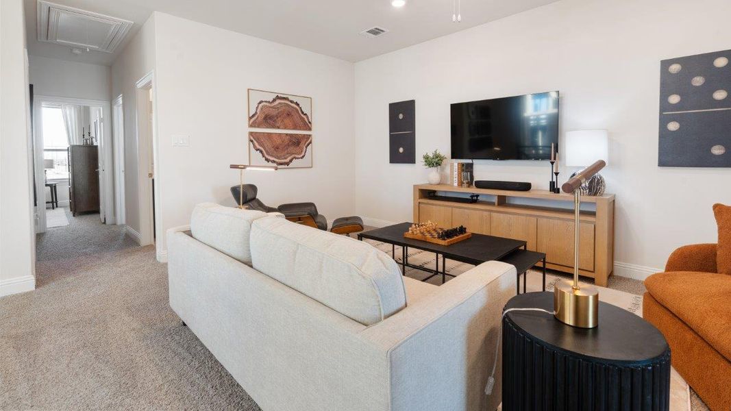 Representative furnished interior of a home built from the Picasso by D.R. Horton in Waterbend, Euless (Image 13).