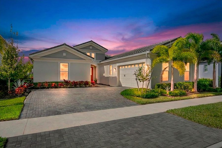 Front exterior of a new home in , The Acreage, FL, highlighting curb appeal (Image 21).